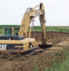 Hump removal with excavator