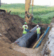 Pipe extension during road widening